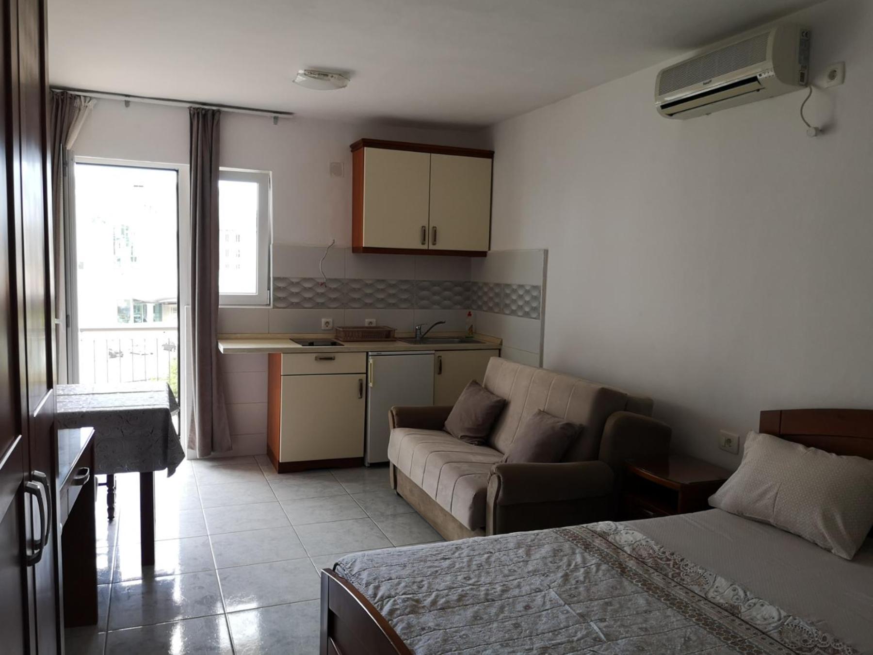 Apartmani Becici Cameră foto